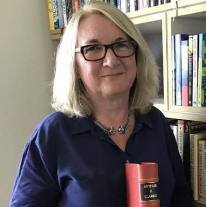 Anne Charnock  with the 2018 Arthur C. Clarke Award for her novel Dreams Before the Start of Time. Photo by Garry Charnock.