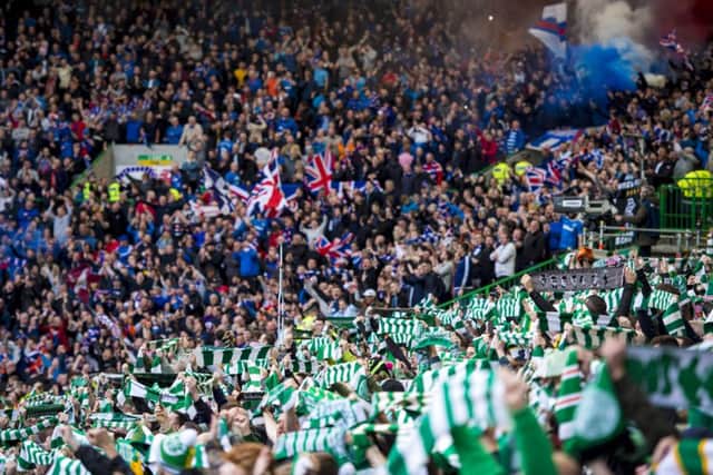 Celtic and Rangers fans at Celtic Park. Picture: SNS Group