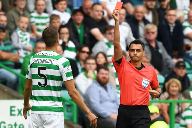 Referee Horatiu Fesnic sends Jozo Simunovic off in the second leg against Alashkert. Picture: SNS