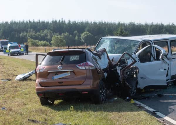 The scene on the A96 between Huntly and Keith in Moray where a five people have died and five more were injured after a crash between a minibus and a car. Picture: Michal Wachucik/PA Wire