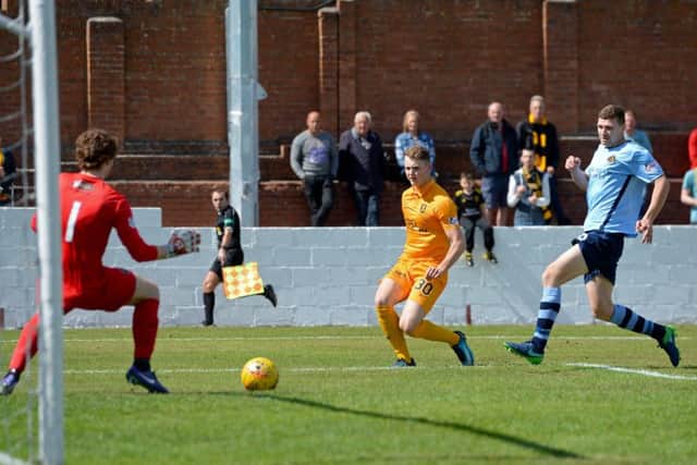 Livingston's Jack Hamilton opens the scoring. Pic: SNS/Ross MacDonald