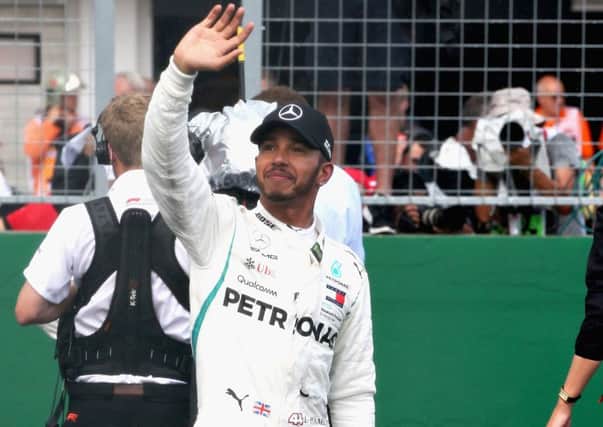 Pole position qualifier Lewis Hamilton celebrates in during qualifying. Pic: Charles Coates/Getty Images