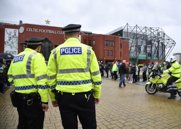 Police outside Celtic Park. Picture: John Devlin.