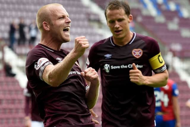 Stven Naismith celebrates scoring his second and Hearts fifth goal against Inverness. Picture: SNS.