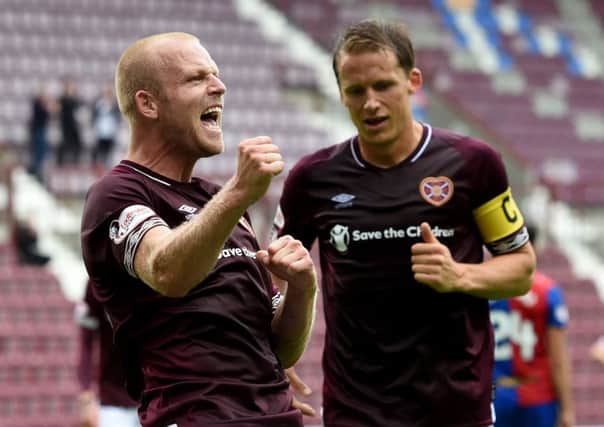 Stven Naismith celebrates scoring his second and Hearts fifth goal against Inverness. Picture: SNS.