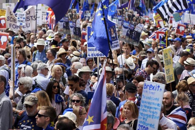Demonstrators carry banners and flags as they participate in the People's March demanding a People's Vote on the final Brexit deal. Picture: Getty