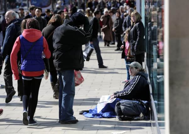 Homeless people on Princes Street. Picture: Greg MacVean