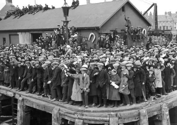 Emigrants waved off from the Hebrides as the ship Metagama sets sail for Canada in April 1923. PIC: Getty.
