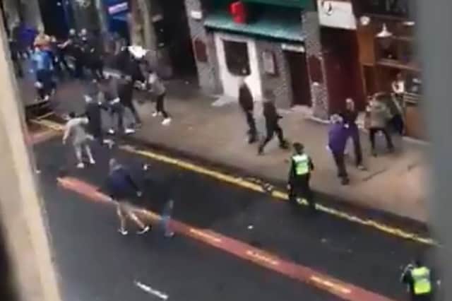A screenshot from a video posted on Twitter showing the street brawl in Glasgow city centre. Picture: Contributed