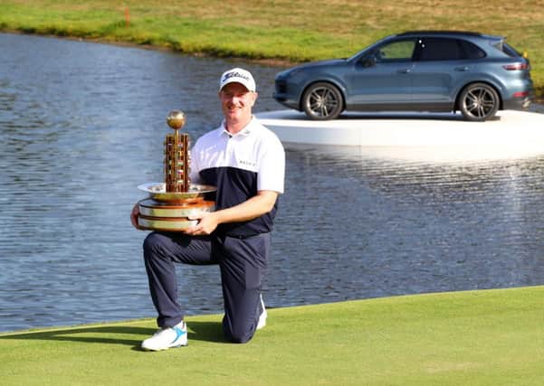 Richard McEvoy poses with the trophy after his victory at the Porsche European Open. Pic: Matthew Lewis/Getty Images