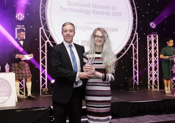 Graeme Smith, managing director of Amazons Edinburgh development centre at last years SWIT award with Alyssa Ross receiving a rising star award. Picture: Contributed