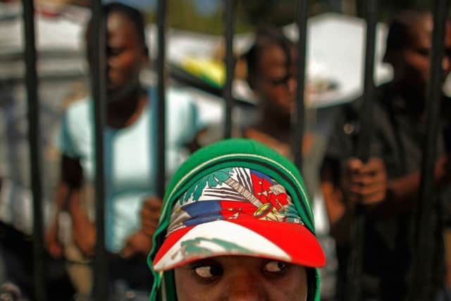 Six months after the first exposure of abuse, in Haiti, the aid sector has been attacked by a committee of MPs who say it has been subverted by sexual predators. Picture: AFP/Getty
