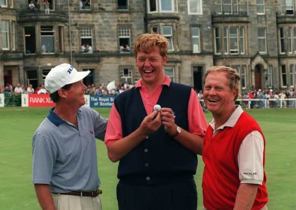 Gordon Sherry, centre, celebrates making a hole-in-one in a practice round with Tom Watson, left, and Jack Nicklaus on the Old Course ahead of the 1995 Open.