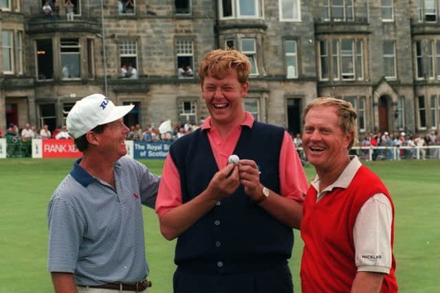 Gordon Sherry, centre, celebrates making a hole-in-one in a practice round with Tom Watson, left, and Jack Nicklaus on the Old Course ahead of the 1995 Open.
