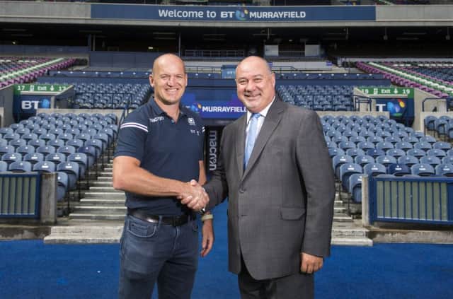 Gregor Townsend celebrates with SRU chief Mark Dodson yesterday. Picture: SNS/SRU