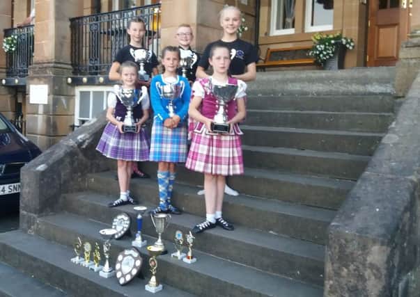 Back Row, Amber Allenby, Harry Aiken and Mollie Mae Aiken
Front row Eilidh McTaggart, Summer leonard and Amy Jardine
This is the dance school's trophies won in July. Photo by Kathryn Armstrong.