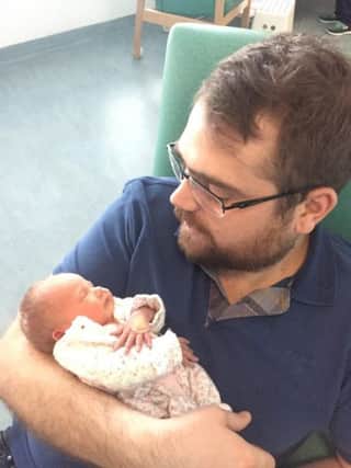 The quick-thinking dad delivered his baby daughter at home on the bathroom floor used his Apple headphones to tie off the umbilical cord.
 Picture: contributed