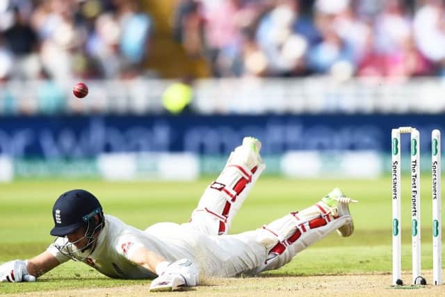 England captain Joe Root is run out by counterpart Virat Kohli. Picture: Nathan Stirk/Getty