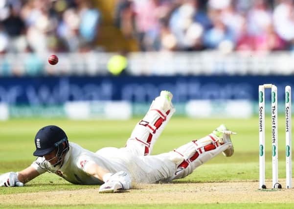 England captain Joe Root is run out by counterpart Virat Kohli. Picture: Nathan Stirk/Getty