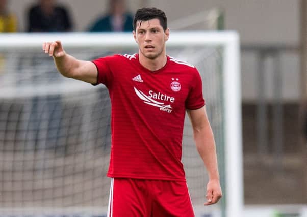 Scott McKenna will be watched by scouts when Aberdeen take on Burnley at Turf Moor. Picture: Ross Parker/SNS