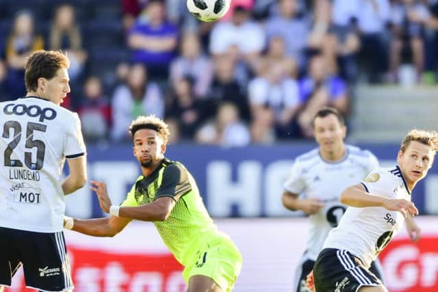 Scott Sinclair, centre, battles with Marius Lundemo, left, and Vegar Eggen Hedenstad of Rosenborg. Picture: Ole Martin Wold/NTB scanpix via AP
