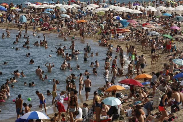 Much of Spain is on alert as the country's weather agency warns that temperatures could surpass 40 degrees Celsius (104 Fahrenheit) due to a hot air mass moving northward from the African continent. Picture: AP Photo/Manu Fernandez