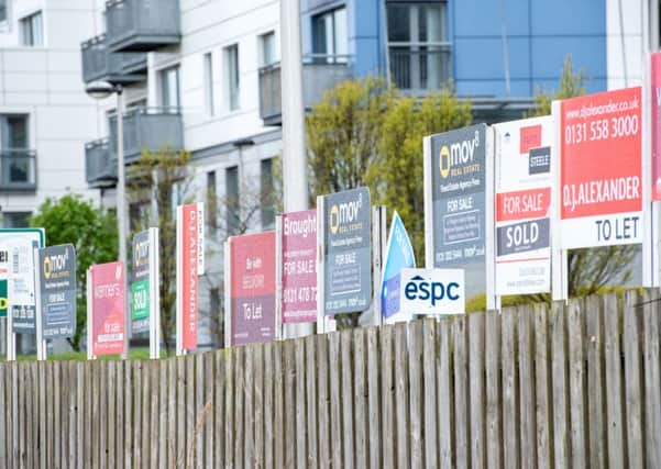 The for-sale signs mask the problems faced by many trying to get on the property ladder (Picture: Ian Georgeson)