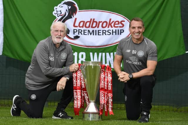 Celtic manager Brendan Rodgers with club legend Danny McGrain, left, who will unfurl the league flag before the Livingston match. Picture: Rob Casey/SNS