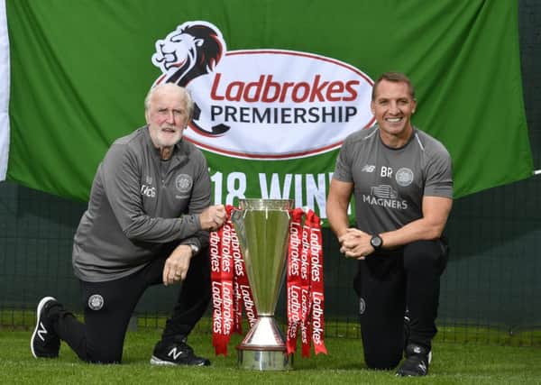 Celtic manager Brendan Rodgers with club legend Danny McGrain, left, who will unfurl the league flag before the Livingston match. Picture: Rob Casey/SNS