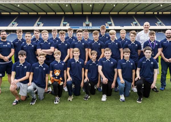 The schools under-16 squad gathered at Murrayfield yesterday with former Scotland captain Al Kellock, back right. Picture: Roddy Scott/SNS