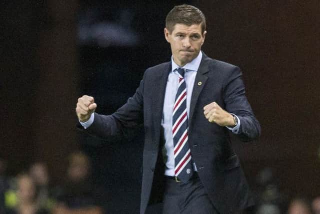 A mixture of pleasure and relief as Rangers manager Steven Gerrard reacts to the final whistle. Picture: PA.
