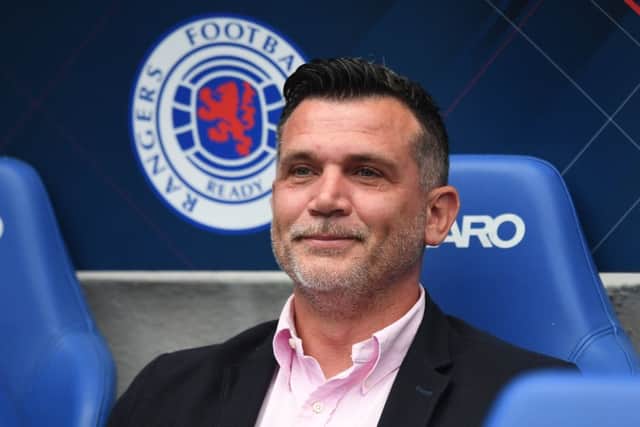 Osijek manager Zoran Zekic sits in the dugout at Ibrox. Picture: SNS