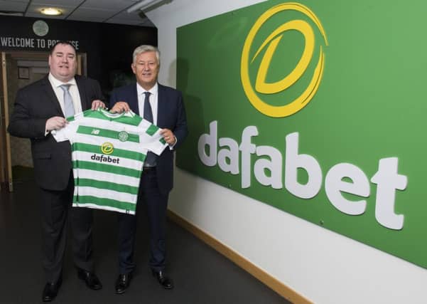 Celtic chief executive Peter Lawwell, right, pictured with John Cruces of Dafabet. Picture: SNS