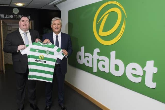 Celtic chief executive Peter Lawwell, right, pictured with John Cruces of Dafabet. Picture: SNS