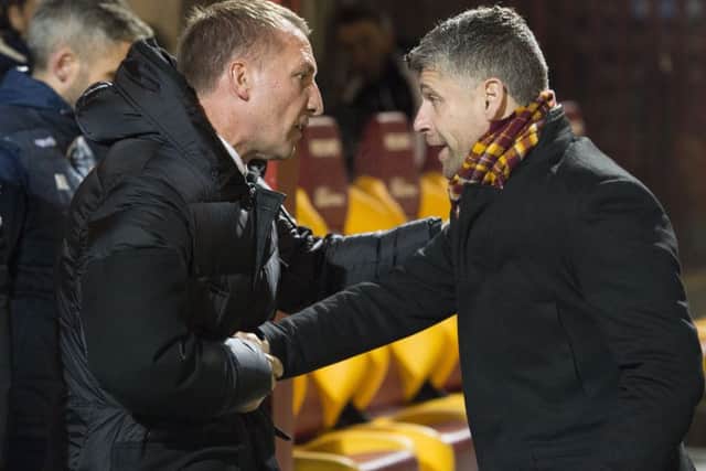 Celtic manager Brendan Rodgers and Motherwell boss Stephen Robinson are not expected to leave their post first. Picture: SNS/Ross Parker