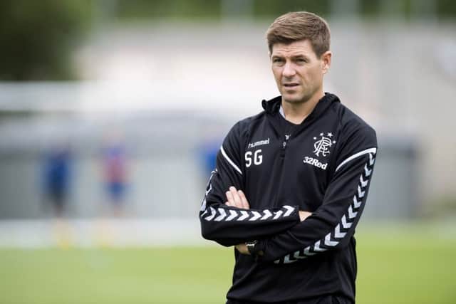 Steven Gerrard oversees training at the Hummel Training Centre ahead of Rangers' league opener against Aberdeen. Picture: SNS Group
