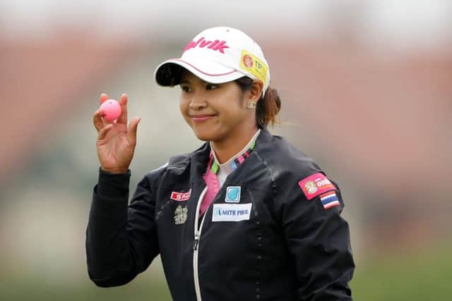 Pornanong Phatlum of Thailand smiles on her way to a second-round 67 at the Ricoh Women's British Open at Royal Lytham. Picture: Richard Heathcote/Getty Images