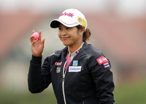 Pornanong Phatlum of Thailand smiles on her way to a second-round 67 at the Ricoh Women's British Open at Royal Lytham. Picture: Richard Heathcote/Getty Images