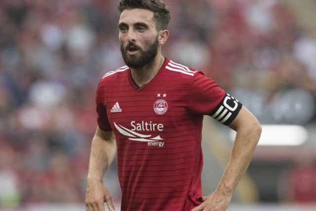 Graeme Shinnie says adrenaline will get the Aberdeen players through Sunday's league opener against Rangers. Picture: Craig Foy/SNS