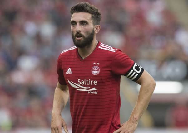 Graeme Shinnie says adrenaline will get the Aberdeen players through Sunday's league opener against Rangers. Picture: Craig Foy/SNS