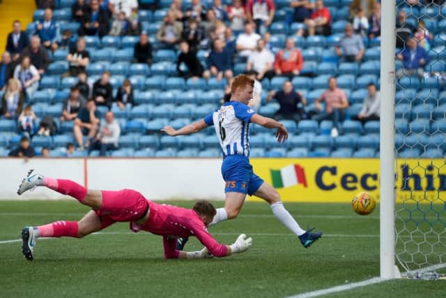 Scott Boyd taps into an empty net for Kilmarnock's opener. Picture: SNS Group