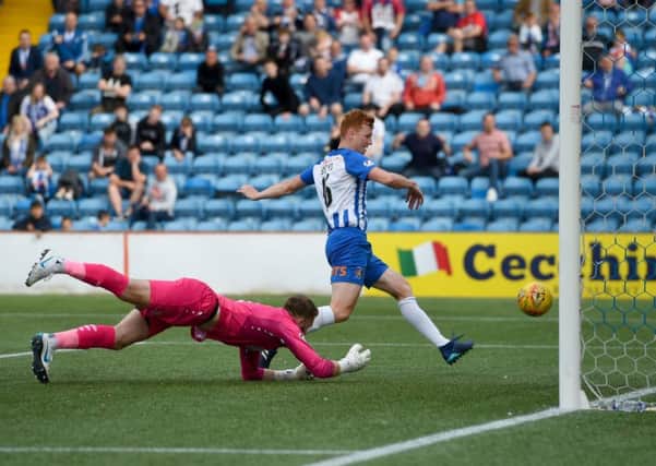 Scott Boyd taps into an empty net for Kilmarnock's opener. Picture: SNS Group