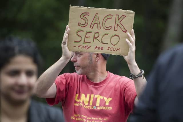 Protesters at SERCO offices and the Home Office offices offer their opinion on the company. Picture: John Devlin