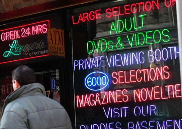 Porn was once largely restricted to magazines and sex shops but is now easily available online (Picture: Chris Hondros/Getty Images)