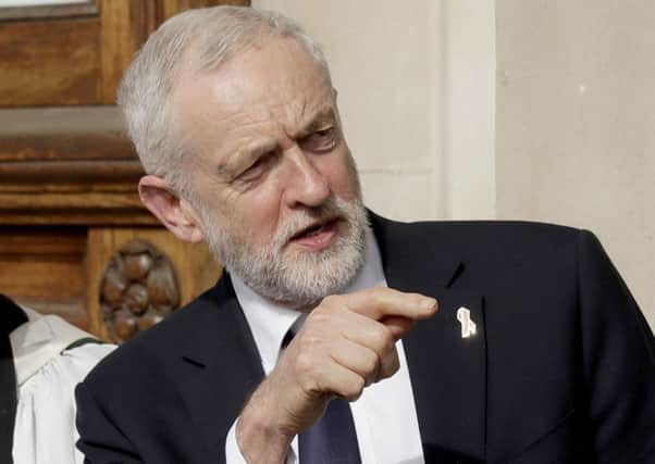 Supporters want to see Labour vote down Theresa Mays Brexit deal in October, call a general election, then call another referendum, or Peoples Vote. Picture: AP