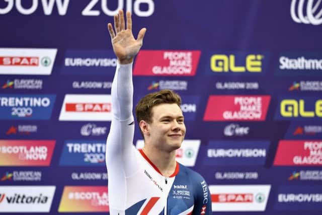 Jack Carlin celebrates winning bronze in the men's keirin. Picture: Getty