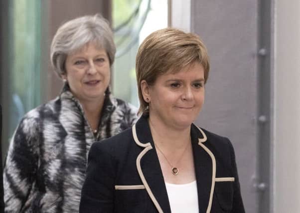 Prime Minister Theresa May has called on First Minister Nicola Sturgeon to back her Brexit deal. Picture: PA Wire