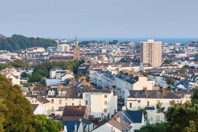 View over Saint Helier, capital of Jersey, Channel Islands, UK on summer evening around sunset.