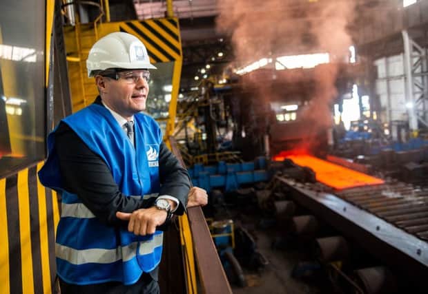 Derek MacKay viewing the rolling mill at Dalzell. Picture: Lenny Warren