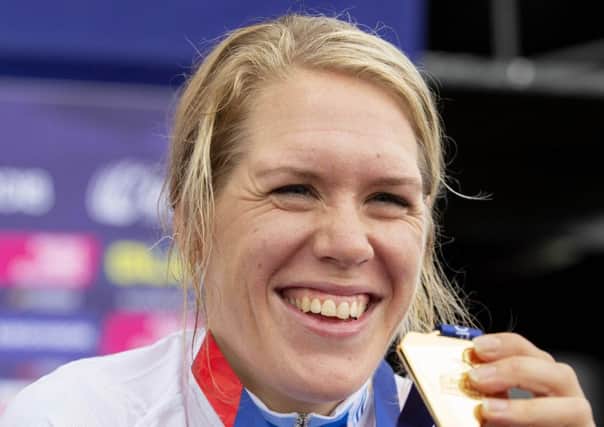 Ellen Van Dijk of the Netherlands celebrates her gold medal in the women's time trial. Picture: Ross Brownlee/SNS